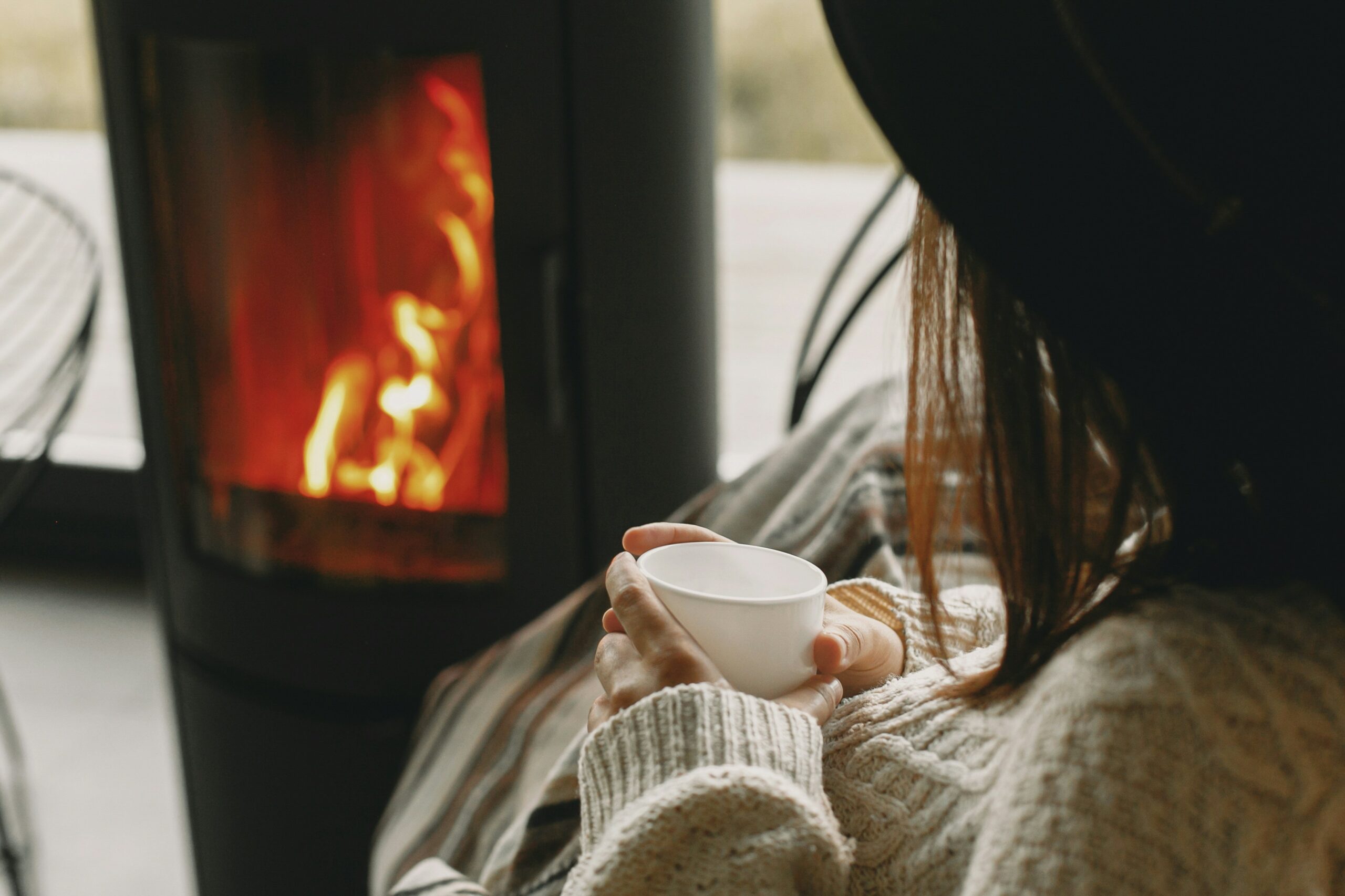 girl keeping warm in winter